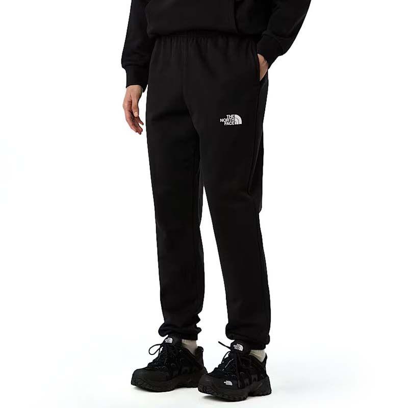 The North Face Ženski donji dio trenerke Simple Dome Regular Tapered Jogger, Crni