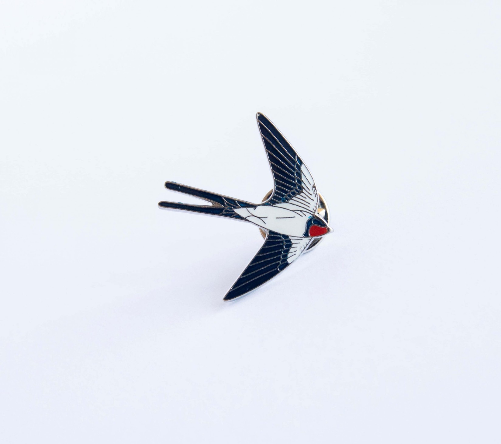 Monticola Bedž  Seoska lasta (Hirundo rustica)